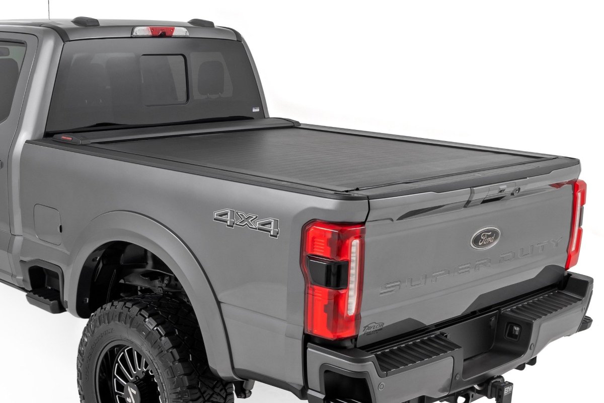 Ford F-350 Super Duty Retractable Bed Cover - Rough Country - Weather-resistant Vinyl with Rigid Aluminum Panel - Matte Black - '17-'24